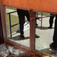 The smashed windows of the Sea Cave arcade.